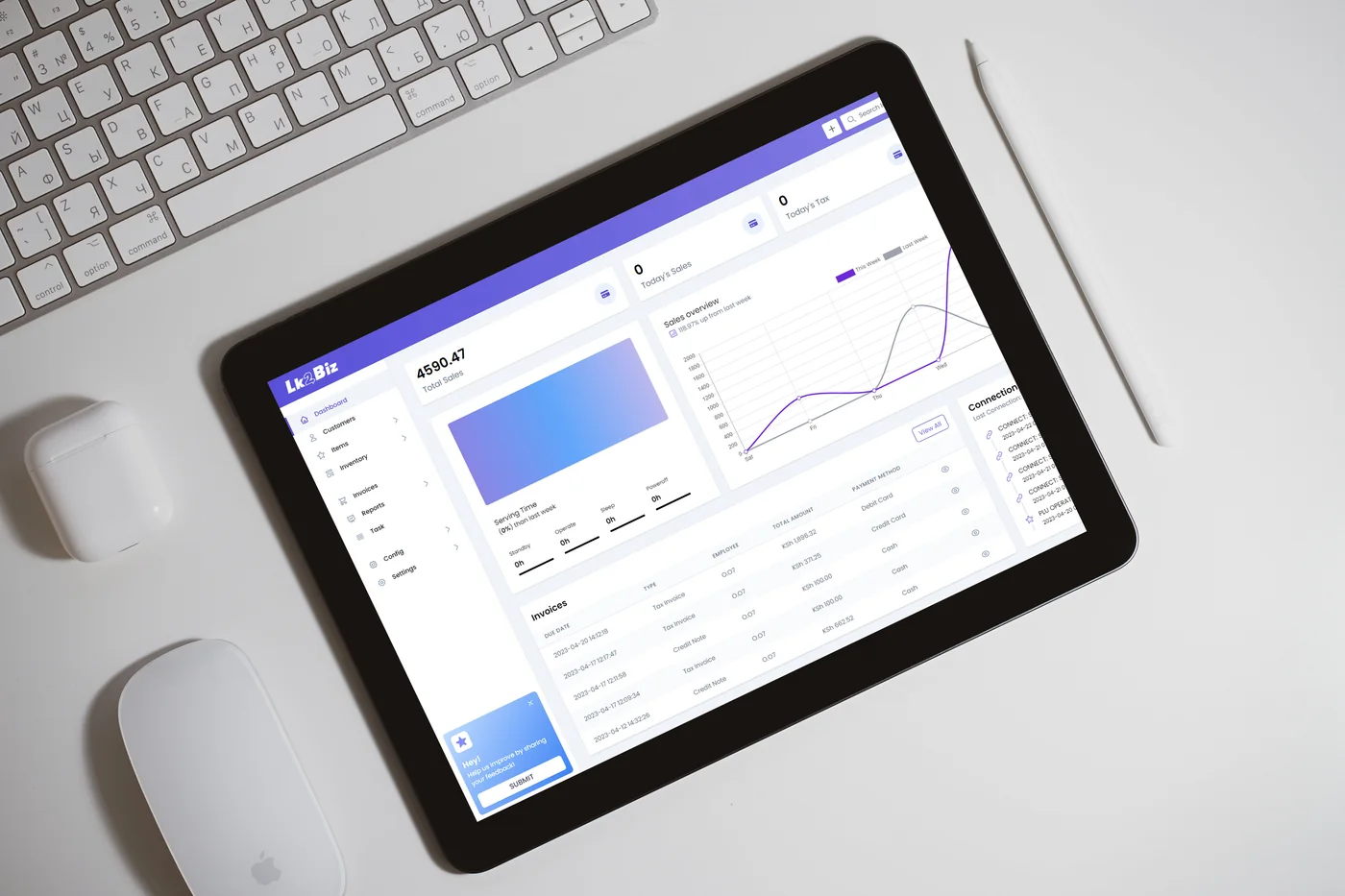Lk2Biz dashboard displayed on a tablet beside a keyboard